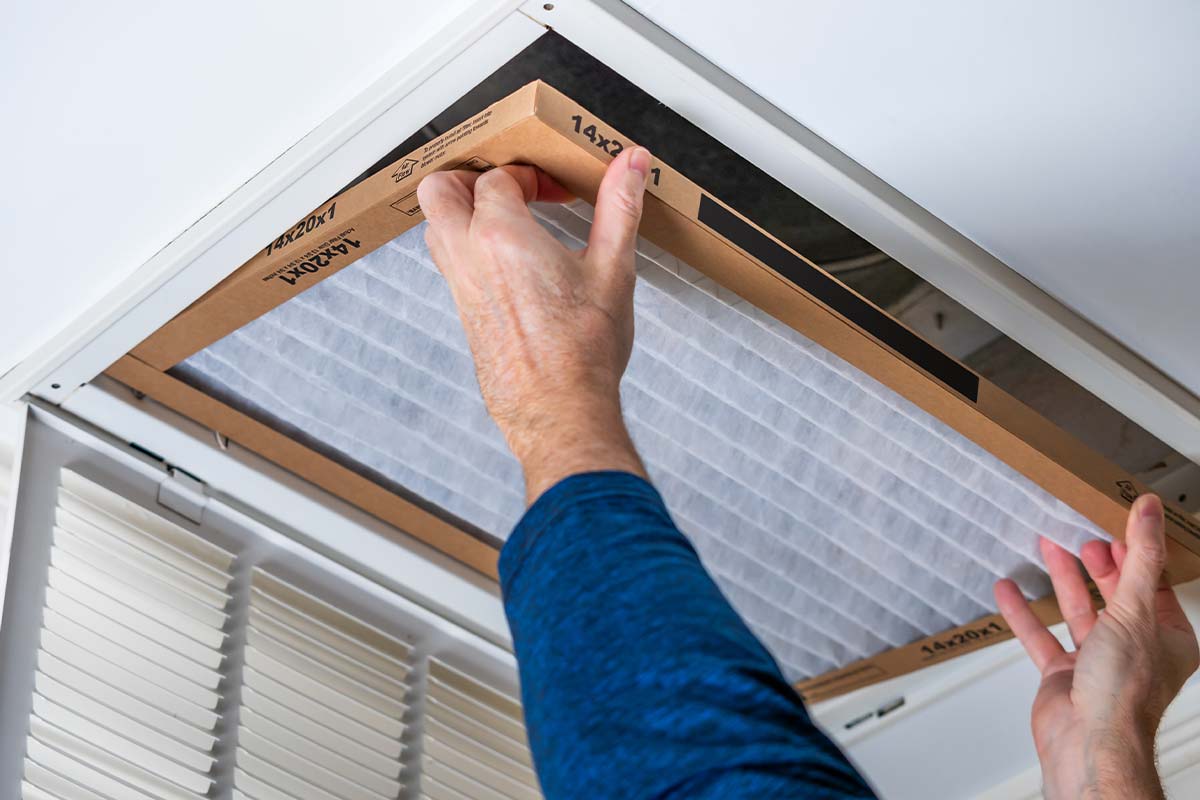 Replacing the air filter during Residential Duct Cleaning Service